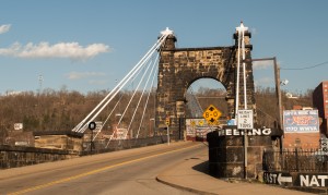 Wheeling, W.Va.:  Suspension Bridge (1849) across  Ohio River's main channel.  The slave market was one block from WWVA  sign.  3/13/12